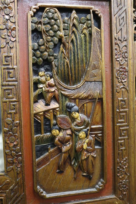 A Chinese carved wall mirror W.101cm